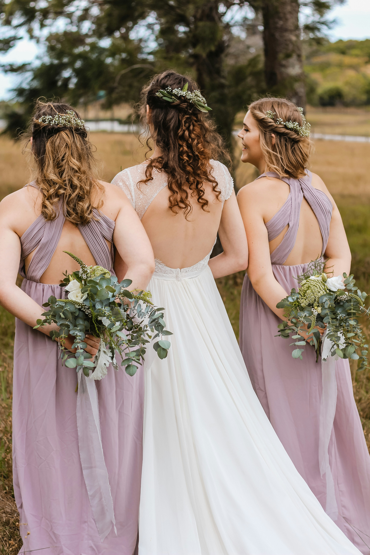 Bride and bridesmaids with eucalyptus bouquets