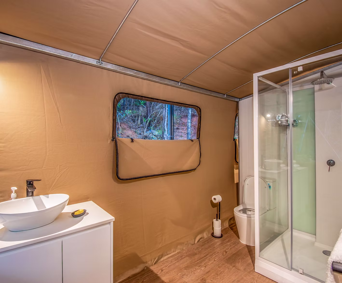 Tent 4 exterior and tropical garden surroundings at Magnetic Glamping