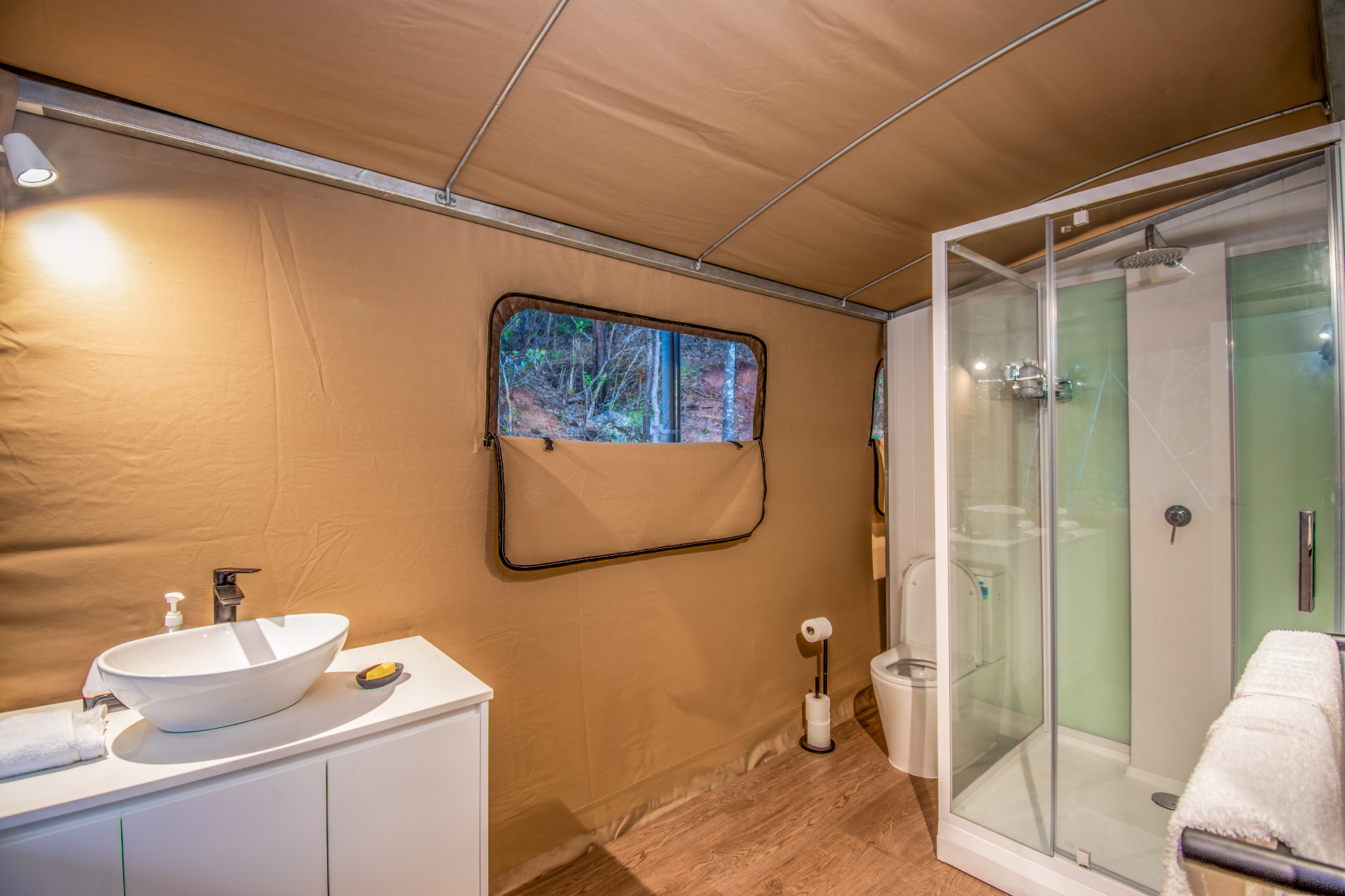 Tent 3 private ensuite — vessel basin, glass shower and forest outlook, Magnetic Glamping
